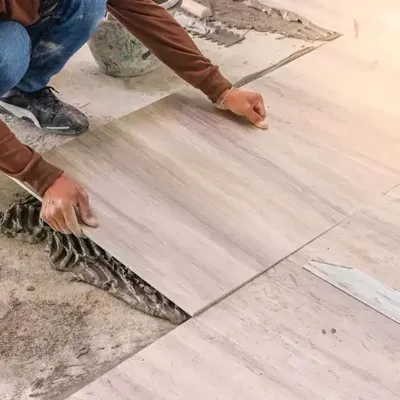 person working on flooring
