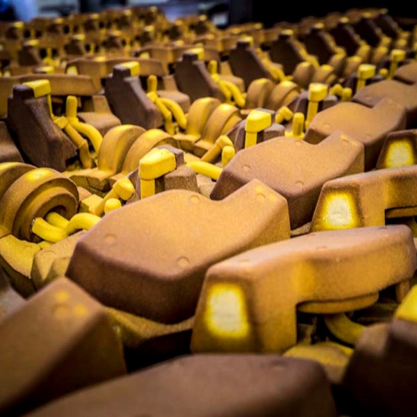 Series of shell cores utilizing TECHNISAND TRUCOAT high performance resin-coated sand for core and mold casting systems that dramatically lower odors, smoke and emissions while still providing superior performance with high quality foundry sand.