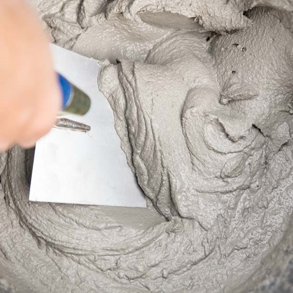 Closeup mix of concrete or construction mix used for abrasion resistant, traffic excessive applications. High silica content in GRANUSIL for building products.