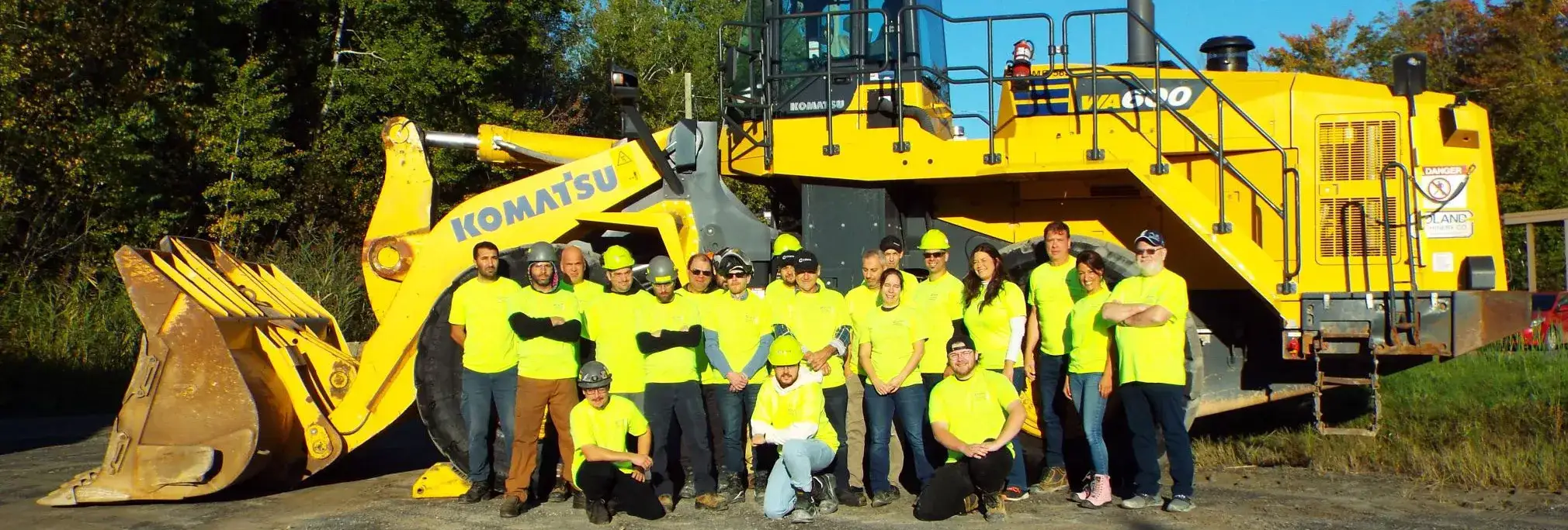 workers in front of equipment