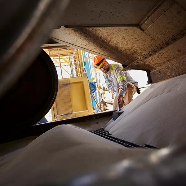 sand and a construction worker