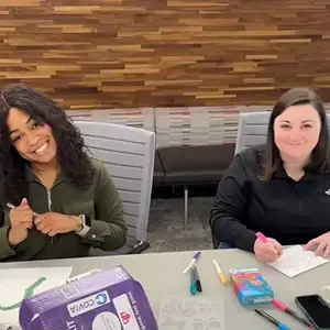 two women smiling