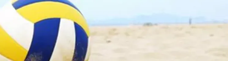 Sports volley ball on well draining off white BESTSAND volley ball sand with consistent texture, less glare, and no crusting.